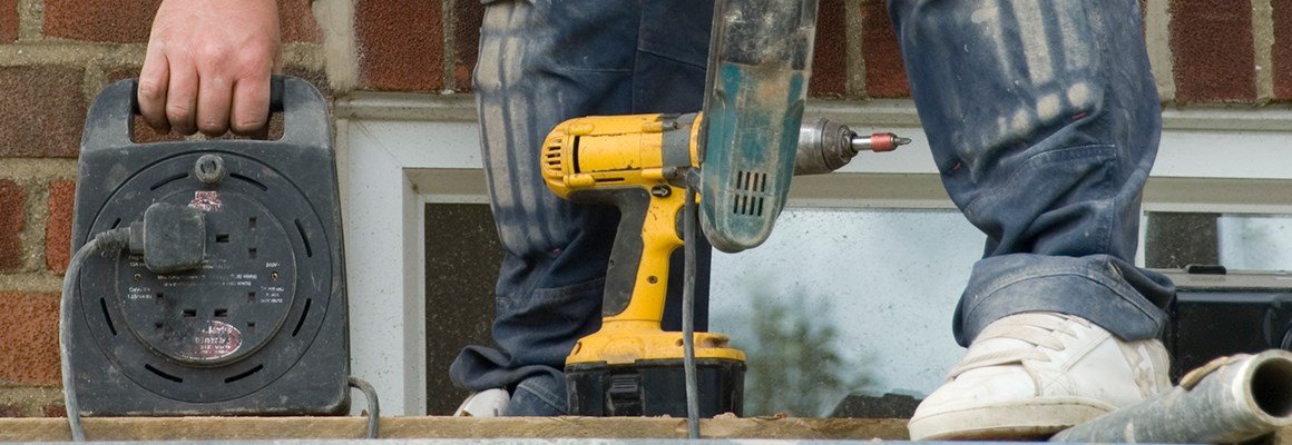 home-maintenance-feet-drill-and-plug